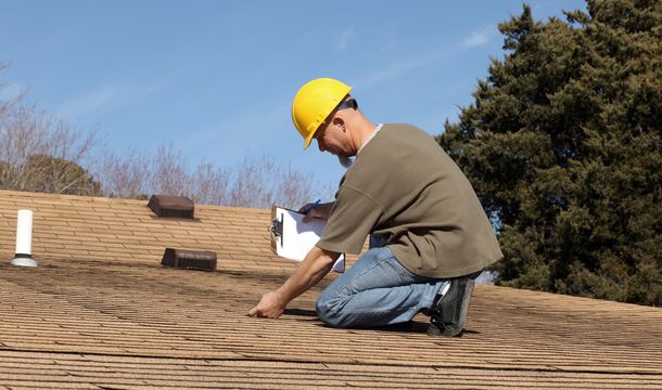 Laying down black shingles